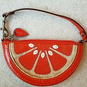 Coach orange key/change/lipstick  purse